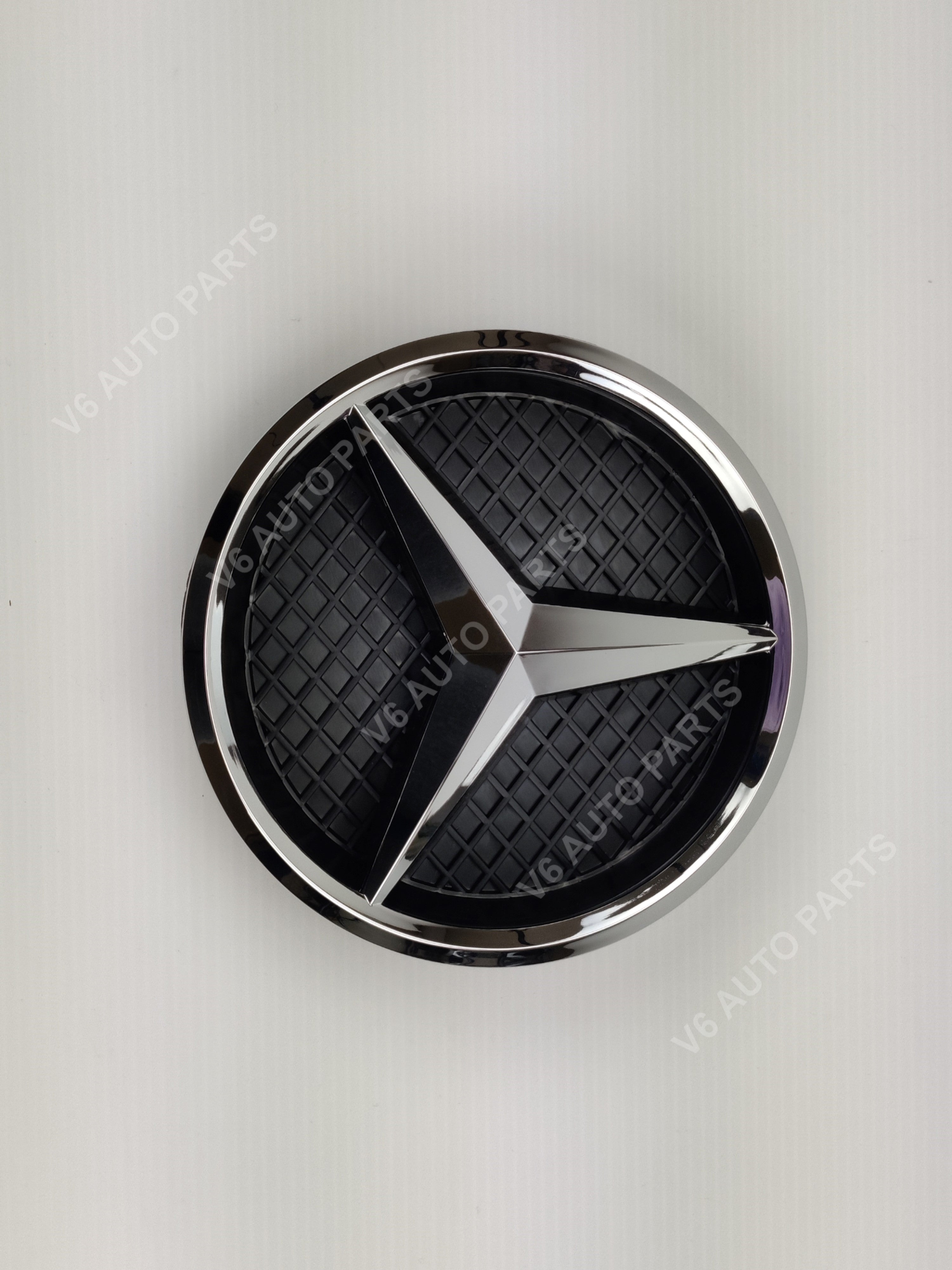 Mercedes emblem on white background, E1-C front grille emblem for GLA-Class X156 2013-2018, chrome star badge base.