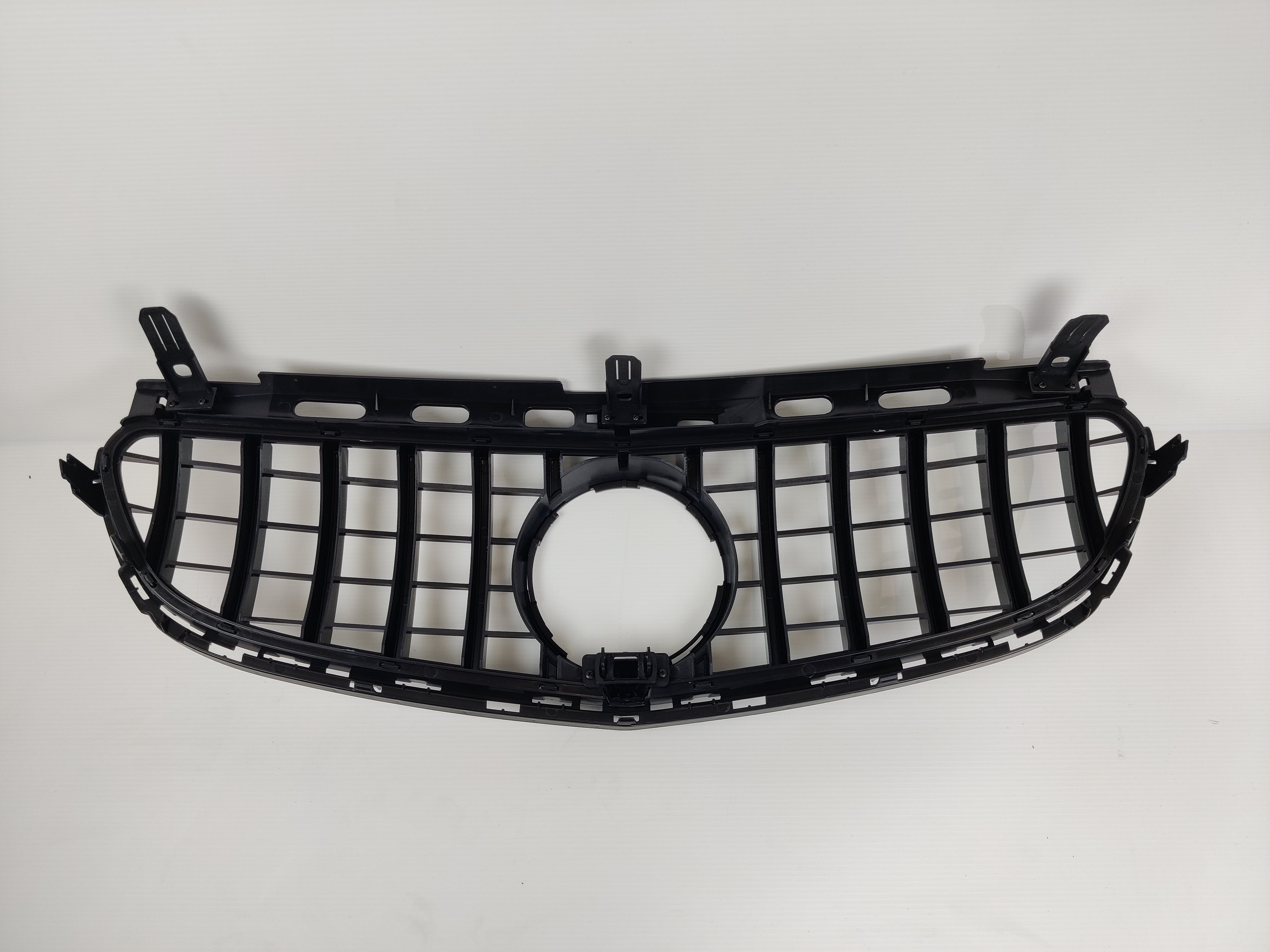 Mercedes E-Class black grille with chrome frame.